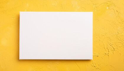 Wall Mural - Blank rectangular white poster, yellow cement surface. Mock-up for design presentation or portfolio