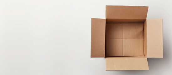 Aufkleber - An opened box against a white background with copy space image.