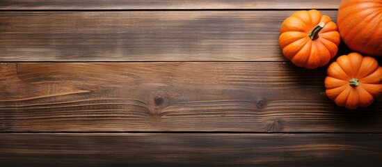 Aufkleber - Top view of a rustic wooden table with an orange pumpkin as the focal point, with ample copy space image.