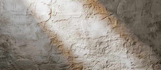 Wall Mural - Close-up shot of a light wall with a textured surface, perfect for use as a background in a copy space image.