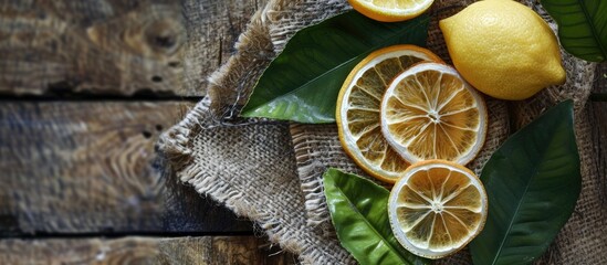 Poster - A healthy meal featuring a dried lemon slice as part of a food snack, arranged on a rustic table with a food background and copy space image in a top view.
