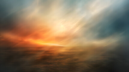 Wall Mural - A blurry image of a beach with a sunset in the background