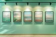 © Lal - Five frames, artistically arranged on a seafoam green wall, illuminated by individual spotlights, offering a refreshing visual display in