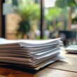 © zz - Stack of Papers on Wooden Table