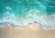 © MD - Aerial View of Turquoise Ocean Waves Crashing on Sandy Beach
