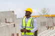 © JU.STOCKER - Engineer man in hardhats working at construction site, Foreman checking project at the precast concrete factory site