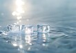 © MD - Two Ice Cubes Floating in Water with Sunlight Reflection