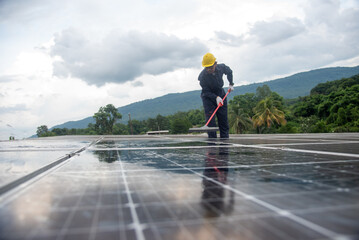 Wall Mural - cleaning staff Solar panels are making up the photovoltaic system on the roof.