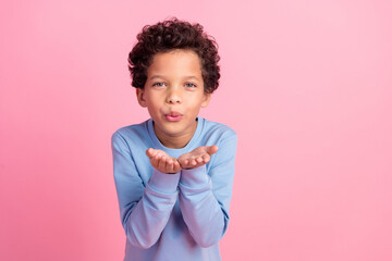 Sticker - Photo of handsome good mood grandson wear blue sweater sending you kiss emtpy space isolated pink color background