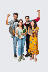 Wall Mural - Asian Indian smart college students posing for a photo against white background