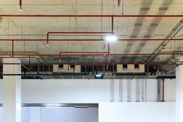 Wall Mural - Ceiling mounted cassette type air conditioner in factory hall.