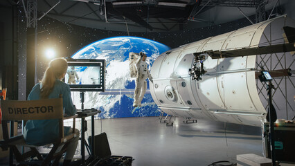 Successful Female Director Leads a Diverse Crew in Filming a Sci-fi Movie Using Virtual Production and Cgi, Featuring an Astronaut on a Futuristic Set With Advanced Equipment and Immersive Visuals.