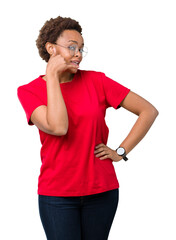 Sticker - Beautiful young african american woman wearing glasses over isolated background smiling doing phone gesture with hand and fingers like talking on the telephone. Communicating concepts.