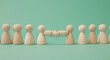 © Mahmud - Human-shaped wooden doll with a handshaking icon for business team building concept. employment headhunting, candidate, human resources management, and teamwork design