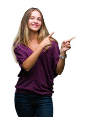 Sticker - Young beautiful blonde elegant woman over isolated background smiling and looking at the camera pointing with two hands and fingers to the side.