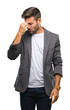 © Krakenimages.com - Young handsome business man over isolated background tired rubbing nose and eyes feeling fatigue and headache. Stress and frustration concept.