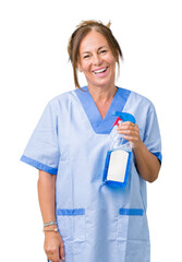 Wall Mural - Middle age brunette cleaner woman wearing housework uniform over isolated background with a happy face standing and smiling with a confident smile showing teeth