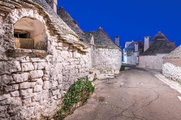 Fototapete - Alberobello, Italy with Trulli Houses