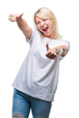 Sticker - Young beautiful blonde woman wearing white t-shirt over isolated background approving doing positive gesture with hand, thumbs up smiling and happy for success. Looking at the camera, winner gesture.