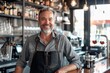 © Baba Images - Portrait of a middle aged Caucasian male bartender