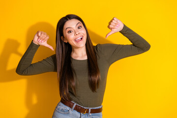 Sticker - Photo portrait of lovely teen lady point self proud dressed stylish khaki garment isolated on yellow color background