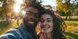 © LukaszDesign - A couple on a romantic date in a garden on vacation. Smile and image of African young man and woman in park on weekend trip.