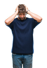 Wall Mural - Handsome hispanic model man wearing winter sweater over isolated background suffering from headache desperate and stressed because pain and migraine. Hands on head.