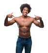 © Krakenimages.com - Afro american shirtless man showing nude body over isolated background looking confident with smile on face, pointing oneself with fingers proud and happy.