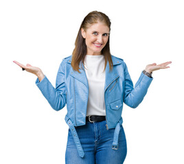 Poster - Beautiful middle age mature woman wearing fashion leather jacket over isolated background Smiling showing both hands open palms, presenting and advertising comparison and balance