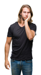 Canvas Print - Young handsome man with long hair over isolated background thinking looking tired and bored with depression problems with crossed arms.