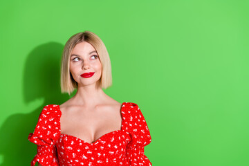 Poster - Photo of stunning lovely cute woman wear red trendy clothes look empty space isolated on green color background