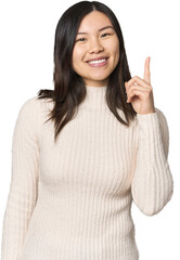 Wall Mural - Young Chinese woman showing number one with finger.