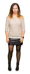 Wall Mural - beautiful middle age woman wearing fashion sweater skeptic and nervous, frowning upset because of pr