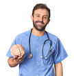© Asier - Hispanic male nurse holding brain happy, smiling and cheerful.