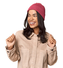 Joyful Filipino woman dancing in studio