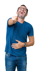 Canvas Print - Handsome middle age hoary senior man wearin glasses over isolated background Laughing of you, pointing to the camera with finger hand over chest, shame expression