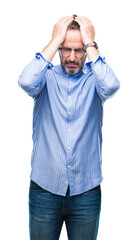 Canvas Print - Middle age hoary senior man wearing glasses over isolated background suffering from headache desperate and stressed because pain and migraine. Hands on head.