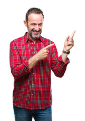 Wall Mural - Middle age hoary senior man over isolated background smiling and looking at the camera pointing with two hands and fingers to the side.