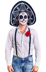 Poster - Man wearing day of the dead costume over background winking looking at the camera with sexy expression, cheerful and happy face.