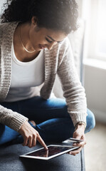 Woman, tablet and browsing in home with credit card, online banking and security details for mobile app in house. Ecommerce, fintech payment and shopping on website, customer and digital transaction