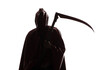 © serikbaib - angel of death, silhouette of the grim reaper with a scythe in a hood on a white background