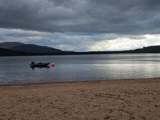 Loch Morlich, Glenmore, Scotland's only fresh water award winning beach is situated at the foot of the Cairngorms, right at the heart of the National Park