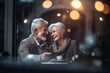 © Canvas Alchemy - Cheerful old couple sitting at a cafe. Senior man and woman sitting at a restaurant table and smiling