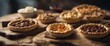 © Marlon - Three delicious looking meat pies on a wooden cutting board.