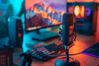© sornram - Cozy gaming setup with microphone, keyboard, and monitor. Perfect for streamers, podcasters, or content creators.