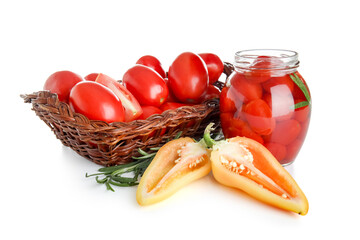 Wall Mural - Jar of pickled tomatoes with rosemary and pepper on white background