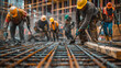 © khonkangrua - Construction workers in safety gear working on a rebar grid at a building site, highlighting teamwork and industrial themes.