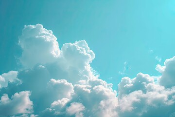 Poster - a sky with clouds and a plane, Fluffy clouds floating across a blue sky, resembling cotton candy and inviting daydreams