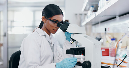 Wall Mural - Medical, research and woman with microscope, healthcare and check experiment for cancer treatment. Person, scientist and employee with lab equipment, vaccine and cure development with biochemistry