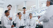 © peopleimages.com - Science, lab and students with question for professor, biotechnology research and pharma education. Learning, group and people in class with mentor for development, scientist training with diversity
